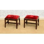 PAIR OF GEORGE III STYLE MAHOGANY FOOTSTOOLS Each with a red velvet drop seat, above the plain