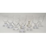 SET OF TEN ENGLISH GLASS WATER GOBLETS Each with a tulip-shaped body, raised on a waisted stem on