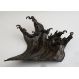 JAPANESE BRONZE MODEL OF THE HOKUSAI WAVE Unsigned; incorporating curled and foamy waves. 5 1/4 x 24