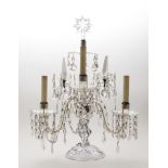 GEORGE III STYLE CUT-GLASS THREE-LIGHT CANDELABRUM The shaped stem supporting the S-scroll arms