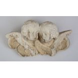 EUROPEAN BAROQUE CARVED MARBLE CHERUB WALL MOUNT Incorporating two cherub heads. 13 x 22 x 6 in.