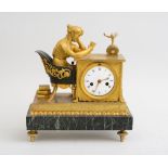 EMPIRE PATINATED AND GILT-BRONZE FIGURAL CLOCK The 3 1/2 in. enamel dial in a draped table-form case