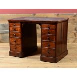 VICTORIAN ROSEWOOD PARTNER'S DESK Fitted with leather top, niche surrounded by ten short drawers,