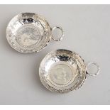 TWO FRENCH COIN-MOUNTED SILVER WINE TASTERS One centered by Louis XVI coin, dated 1783 and with