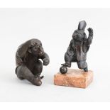 TWO JAPANESE BRONZE FIGURES OF CHIMPANZEES Unmarked; the one wearing a jacket and hat with raised