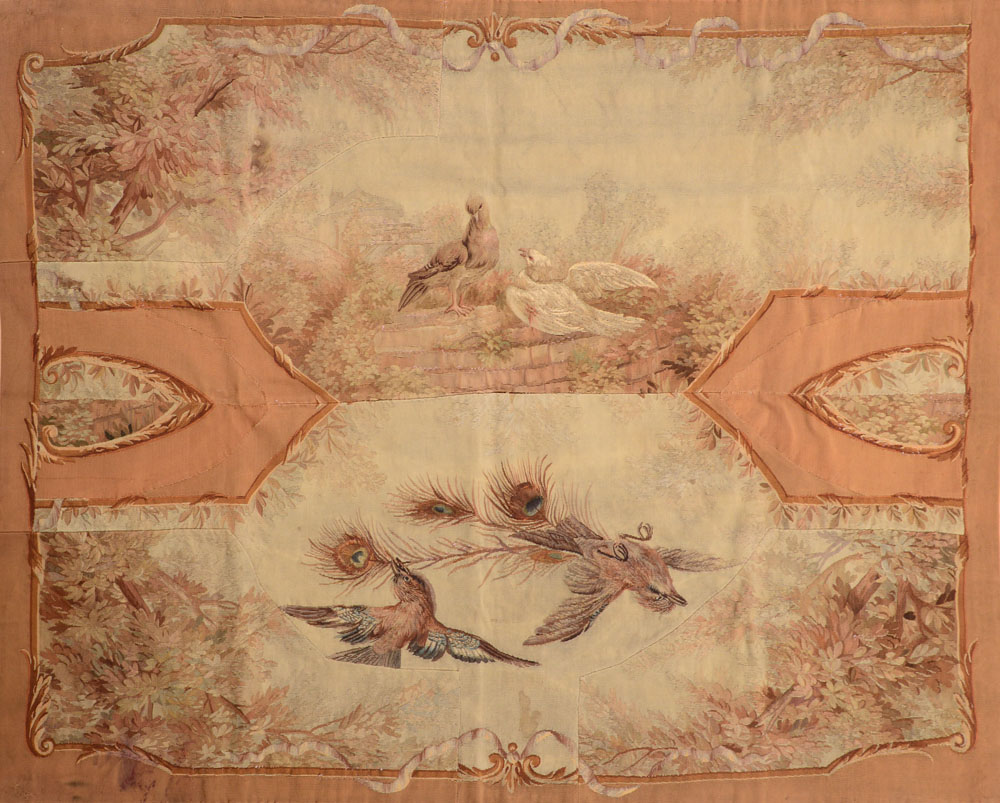 AUBUSSON PIERCED TAPESTRY FRAGMENT Incorporating two stitched panels of paired birds on stone wall