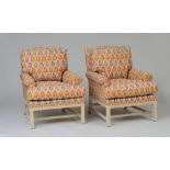 PAIR OF UPHOLSTERED CLUB CHAIRS Together with a matching ottoman. 37 1/2 x 28 1/2 x 32 1/2 in. and