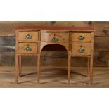 GEORGE III PINE DRESSING TABLE Of breakfront outline fitted with five drawers, raised on square