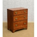 GEORGE III PINE CHEST OF DRAWERS The rectangular top above three graduating drawers, raised on