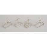 TWO PAIRS OF ENGLISH SILVER TOAST RACKS William Comyns, London, 1893, and AC & Co., Birmingham,