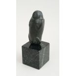 FIGURE OF A SEATED MONKEY Bronze, impressed 'Silverman Collection', on veined marble block stand.