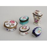 GROUP OF FIVE ENGLISH FLORAL-DECORATED ENAMEL BOXES Comprising two oval, one circular, one egg-