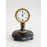 SETH THOMAS SONS & CO. BRASS, EBONIZED AND PARCEL GILTWOOD CLOCK The enamel dial with siagnture