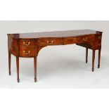 GEORGE III MAHOGANY SERPENTINE-FRONTED SIDEBOARD The serpentine-fronted top above a pair of frieze