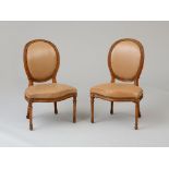 PAIR OF GEORGE III CARVED BEECHWOOD SIDE CHAIRS, MANNER OF THOMAS CHIPPENDALE Each with guilloche-