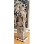 EUROPEAN CARVED STONE MODEL OF A LION-FORMED GARGOYLE Sitting on his hind legs, holding a shield-