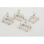 SET OF FOUR SCOTTISH SILVER MINIATURE TOAST RACKS Birmingham, 1930, retailed by Mackay & Chisholm,