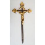 ITALIAN BAROQUE BRONZE AND PARCEL-GILT PROCESSIONAL CROSS The figure of Christ wearing perizonium