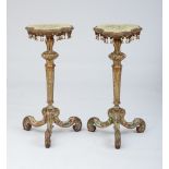 PAIR OF ITALIAN ROCOCO STYLE PAINTED AND PARCEL-GILT PEDESTALS Each with a painted undulated top