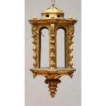 ITALIAN GILTWOOD LANTERN The pierced domed top above the hexagonal-shaped body each with arched