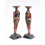 PAIR OF JAPANESE CARVED AND PAINTED WOOD FIGURAL CANDLESTICKS Each in the form of a standing