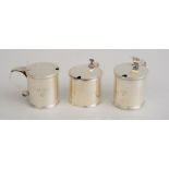 ASSEMBLED PAIR OF STEIFF MONOGRAMMED SILVER MUSTARD POTS With clear glass liners; together with a