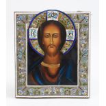 RUSSIAN ICON OF CHRIST PANTOCRATOR IN BLUE ROBES Border with floral stems, laid down on brass