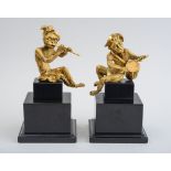 PAIR OF LOUIS XV STYLE GILT-BRONZE SINGERIE FIGURES OF MUSICIANS Each modeled seated; the one