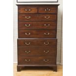 GEORGE III MAHOGANY CHEST ON CHEST The overhanging cornice above two short and three long drawers