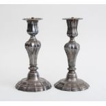 ASSEMBLED PAIR OF EARLY LOUIS XV STYLE SILVERED METAL CANDLESTICKS