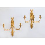 PAIR OF EMPIRE STYLE GILT-BRONZE THREE-LIGHT WALL SCONCES