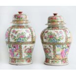 PAIR OF CHINESE EXPORT ROSE MEDALLION BALUSTER-FORM PORCELAIN JARS AND COVERS