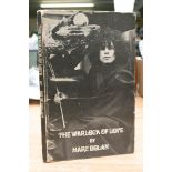 A first edition of 'The Warlock of love' by Marc B