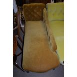 A 1920's chaise longue with button back