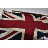 A vintage boy scouts Union Jack with tassels on a