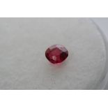 A lovely cushion cut light ruby 0.49ct