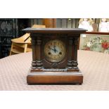 A mahogany cased mantle clock.