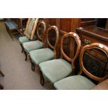 A Set of five Victorian balloon back dining chairs