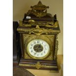 A 19th Century style mantel clock with gilt mounts