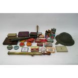 A bag of odds including military tin hat and two w