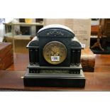 A Late Victorian black slate mantel mantel clock,