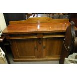 A Victorian chiffonier base with drawers and cupbo