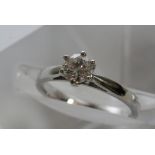 An 18ct white gold solitaire diamond ring 0.80ct a