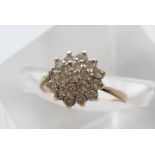 A 9ct gold diamond cluster ring