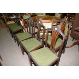 A set of six mahogany dining chairs and an extendi