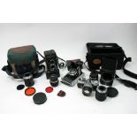 A collection of cameras including rolleicord and r