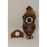 An inlaid mantel clock with French movement and a