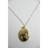 A 9ct gold locket and chain.