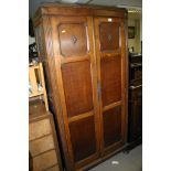 A small oak wardrobe.