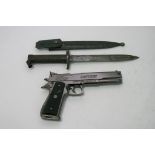 A bayonet and a gun shaped Captain lighter